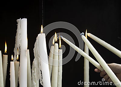Candles lit lourdes Stock Photo