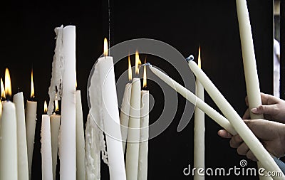 Candles lit lourdes Stock Photo