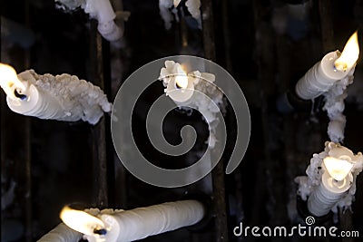 Candles lit lourdes Stock Photo