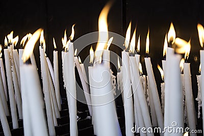Candles lit lourdes Stock Photo