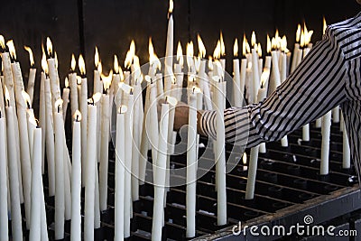 Candles lit lourdes Stock Photo