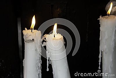 Candles lit lourdes Stock Photo