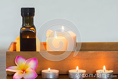 Candles and massage oil composition Stock Photo