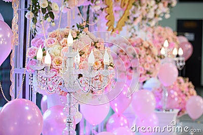 The candlesicks and balloon decorate in backdrop wedding Stock Photo