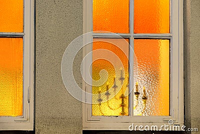 Candlestick seen through window Stock Photo