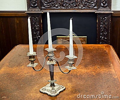 Candlestick top old table for print Stock Photo