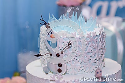 Candy bar, birthday cake for a girl with Olaf snowman, Frozen cartoon character from Walt Disney. Editorial Stock Photo