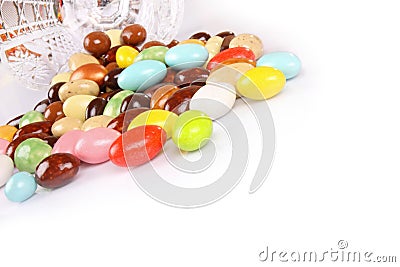 Candy beans with glass jar on white Stock Photo