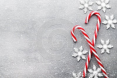 Candy cane. Christmas decors with gray background. Stock Photo