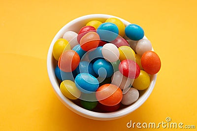 Candy colored balls in a bowl Stock Photo
