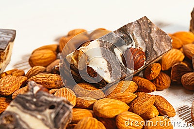 Candy paste and almonds on white wooden background Stock Photo