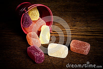 Candy the scattered out of a bucket.tinted Stock Photo
