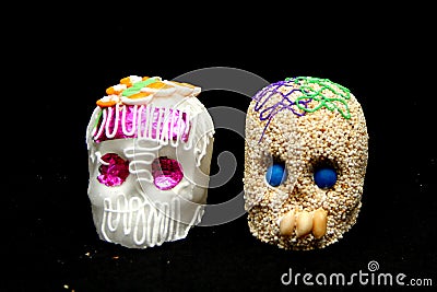 Candy in the shape of a skull made of sugar and amaranth to decorate the offering with candles for the Day of the Faithful Dead an Stock Photo