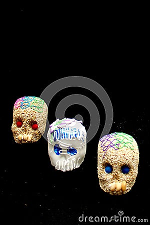 Candy in the shape of a skull made of sugar and amaranth to decorate the offering with candles for the Day of the Faithful Dead an Stock Photo