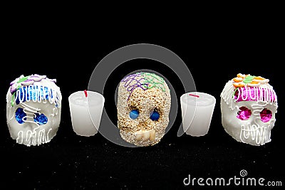 Candy in the shape of a skull made of sugar and amaranth to decorate the offering with candles for the Day of the Faithful Dead an Stock Photo