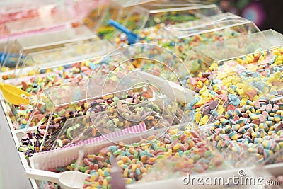 candy shop with boxes of colorful candy, sweets in transparent boxes. Stock Photo