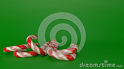 Candycanes with green background Stock Photo