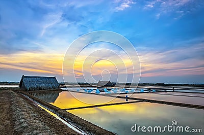 Sunset on salt fields Stock Photo