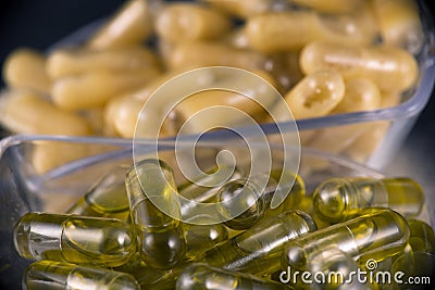 Cannabis extraction capsules infused with shatter and cbd marij Stock Photo