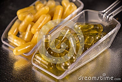 Cannabis extraction capsules infused with shatter and CBD oil Stock Photo
