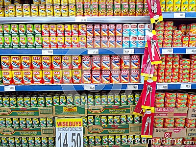 Canned fish sold in a grocery store Editorial Stock Photo