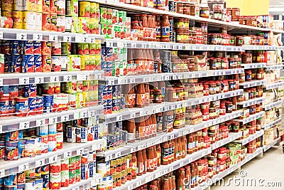 Canned Food And Special Sauces For Sale On Supermarket Stand Editorial Stock Photo