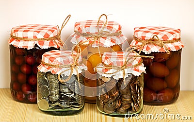 Canned goods on the shelf - savings concept Stock Photo