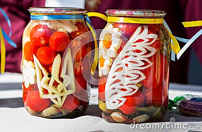 Canned tomatoes with Ukrainian national symbols Editorial Stock Photo