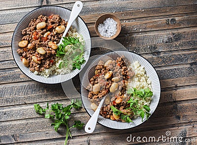 Cannellini beans beef stew with couscous on the wooden table, top view Stock Photo