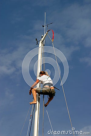 Sailor climbing mast Editorial Stock Photo