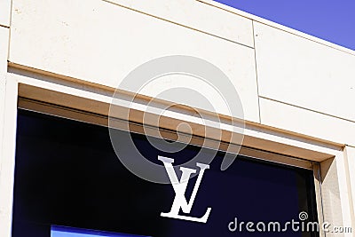 Louis Vuitton logo brand store and sign facade text shop Luxury handbags and luggages Editorial Stock Photo