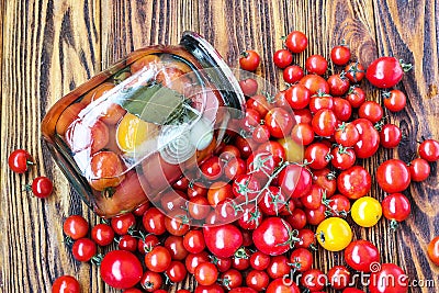 Canning fresh tomatoes with onions in jelly marinade. Vegetable salads for winter. Glass jar of homemade tasty canned tomatoes clo Stock Photo