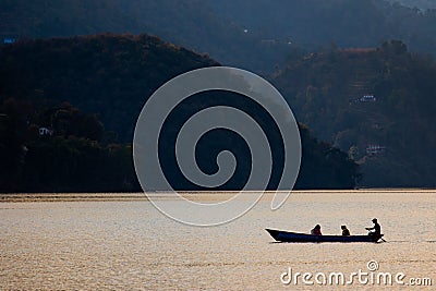 Silhouetted Sunset Canoe Boat Ride Stock Photo