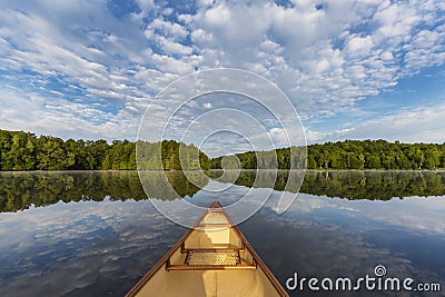 Canoe bow on a Canadian lake in summer Stock Photo