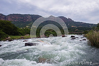 Canoe Jammed River Rapids Editorial Stock Photo