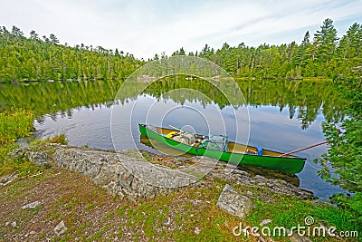 Canoe on a Wilderness Shore Stock Photo
