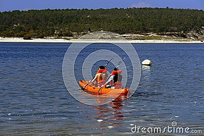 Canoeing boys Stock Photo