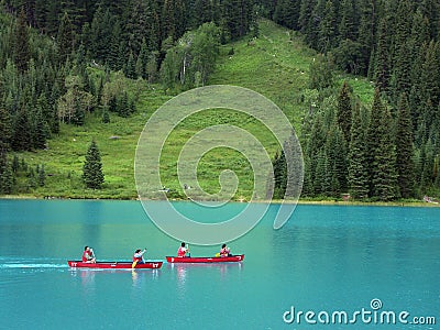 Canoeing on the Emerald Lake Stock Photo