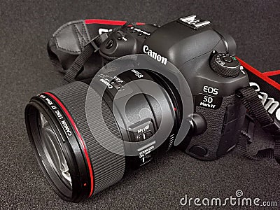 Canon 5D Mark IV camera with Canon EF 85mm f/1.4L IS USM lens. Editorial Stock Photo