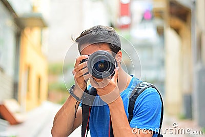 Canon DSLR Photographer camera in hands Editorial Stock Photo