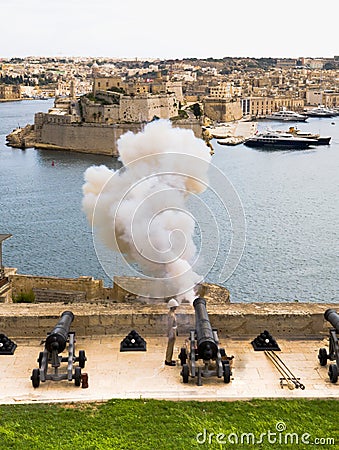 Canons Firing into the Valletta Port Stock Photo