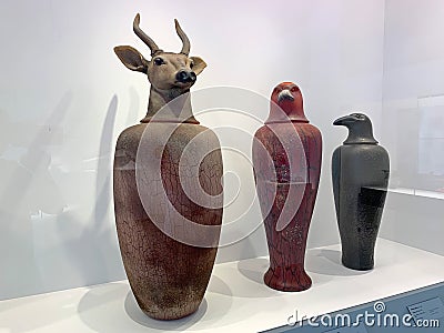 Canopic Jar, Hawk, Raven and Elk, 1993 by William Morris a glass artist Editorial Stock Photo