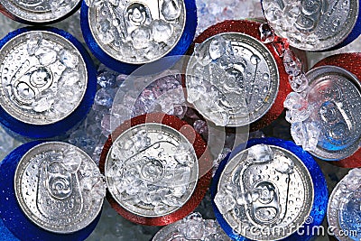 Cans of drink on crushed ice Stock Photo