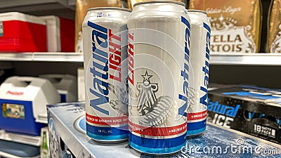 Cans of Natural Light Beer also called Natty Light in a Publix grocery store Editorial Stock Photo