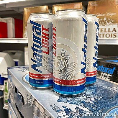 Cans of Natural Light Beer also called Natty Light in a Publix grocery store Editorial Stock Photo