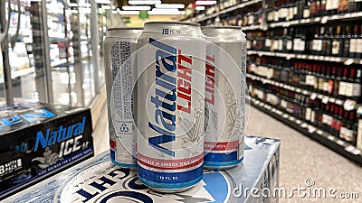 Cans of Natural Light Beer also called Natty Light in a Publix grocery store Editorial Stock Photo
