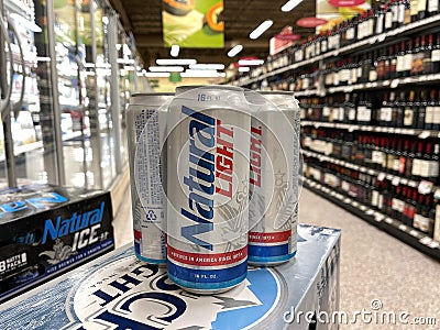 Cans of Natural Light Beer also called Natty Light in a Publix grocery store Editorial Stock Photo