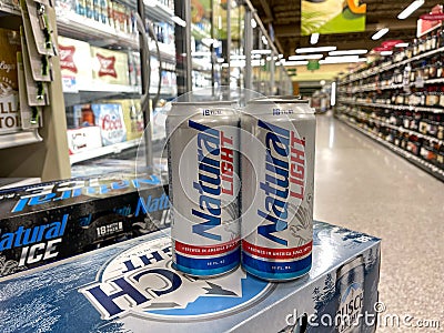 Cans of Natural Light Beer also called Natty Light in a Publix grocery store Editorial Stock Photo