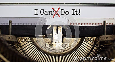 Cant crossed out to read I can do it concept for self belief, positive attitude and motivation written on an old typewriter Stock Photo