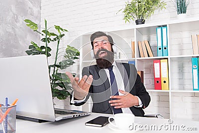 Cant resist music. Businessman enjoy music in office. Bearded man listen to music and sing along to song. Insurance Stock Photo